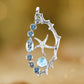 Anhänger Korallenast, Seestern, blauem Topas, Larimar